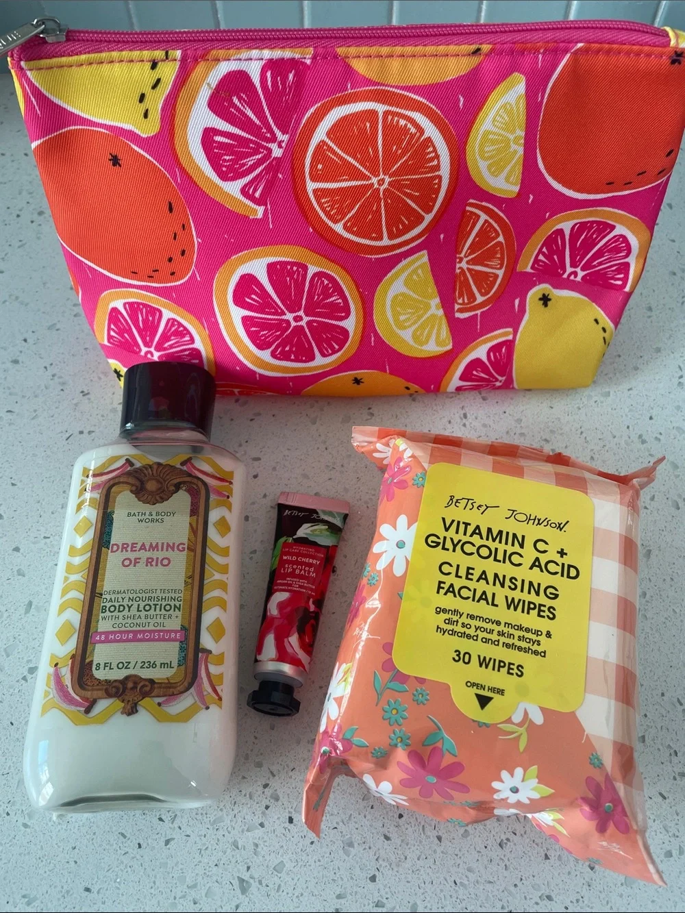 Bundle -Clinique Makeup bag, BBW lotion, Betsey Johnson face wipes, and lip balm